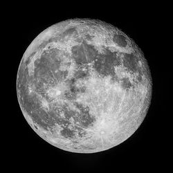 Scenic view of moon against sky at night