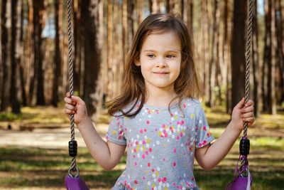 Sitting on swing in playground