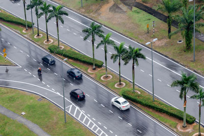 High angle view of vehicles on road in city