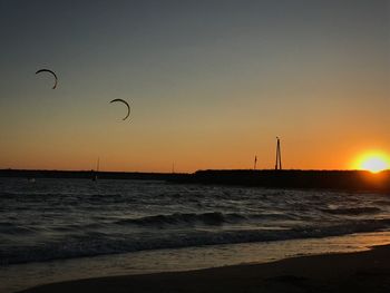 Silhouette of beach at sunset