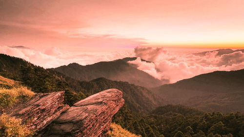 Scenic view of mountains against sky during sunset