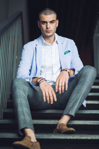 Portrait of young man sitting