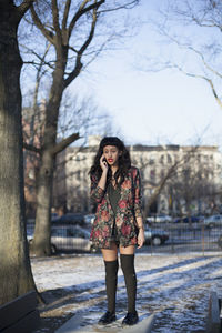 Portrait of a beautiful young woman wearing a leather jacket