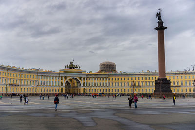 Group of people in front of historical building