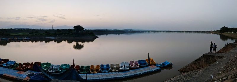 Panoramic view of lake against sky at sunset