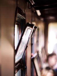 Close-up of open window in train