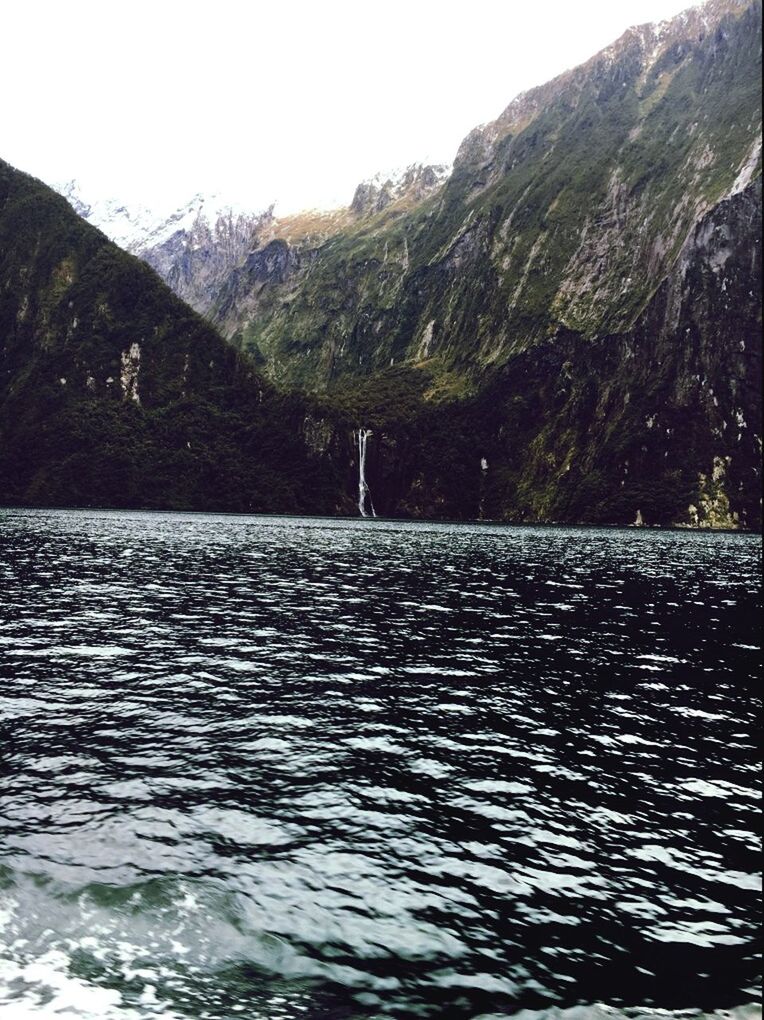 SCENIC VIEW OF RIVER AND MOUNTAINS