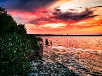 Scenic view of sea against sky during sunset