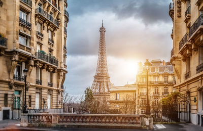 Eiffel tower against sky in city