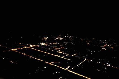 Illuminated cityscape at night