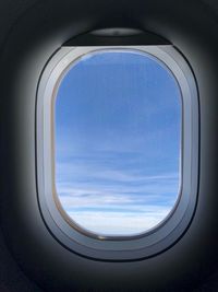 View of sky through airplane window