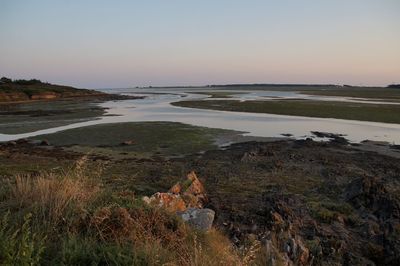 Scenic view of sea against sky during sunset