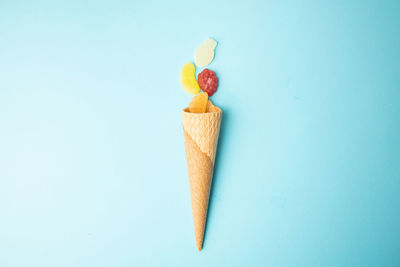 Close-up of colored pencils against white background