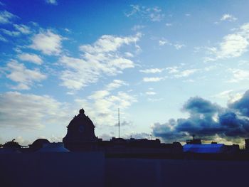 Low angle view of built structure against blue sky