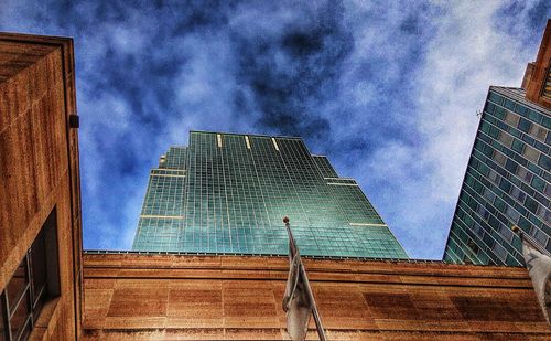 Low angle view of modern building against sky