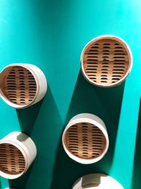 Close-up of electric fan against wall