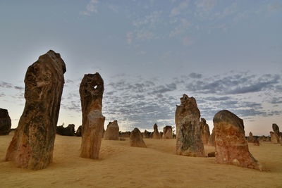 Panoramic view of rock formations against sky