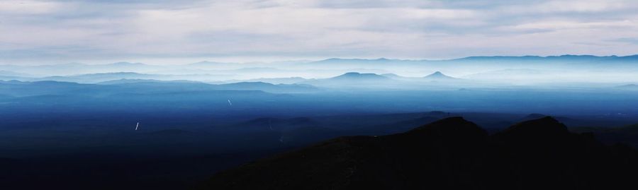 Scenic view of mountains against sky