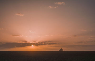 Scenic view of landscape against sky during sunset