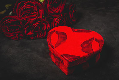 High angle view of red rose on table