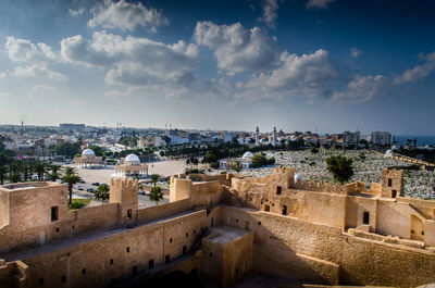 High angle view of monastir townscape by sea