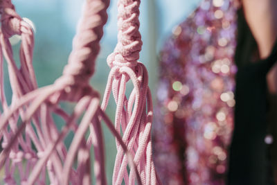 Close-up of pink decoration hanging outdoors