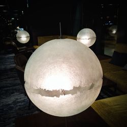 Close-up of illuminated ball on table