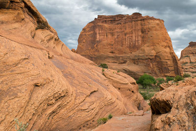 Scenic view of cliff against sky