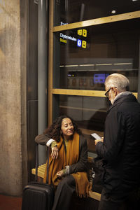 Couple on train station platform