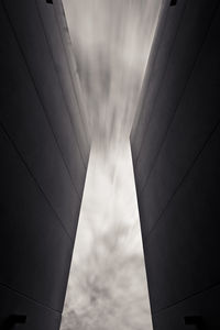 Low angle view of buildings against sky in city