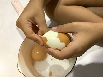 Midsection of woman holding ice cream