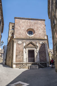 Exterior of historic building against clear sky