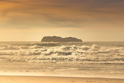 Scenic view of sea against sky during sunset