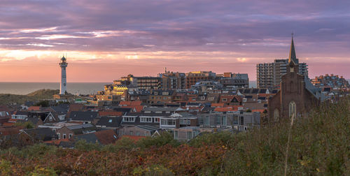 High angle view of townscape against sky during sunset