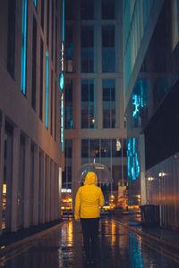 Reflection of buildings in city at night