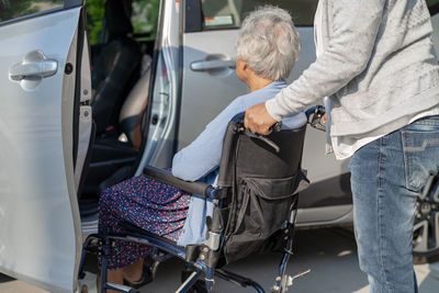 Rear view of people in car