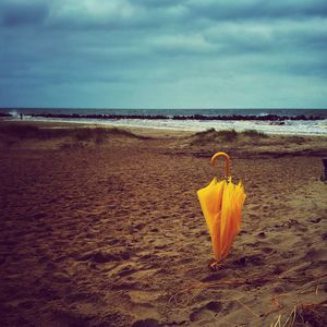 Scenic view of beach against sky