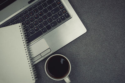 High angle view of coffee cup on table