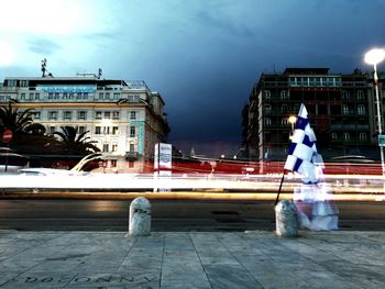 Buildings against cloudy sky