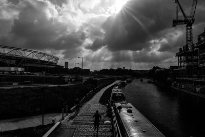 View of railroad tracks against cloudy sky