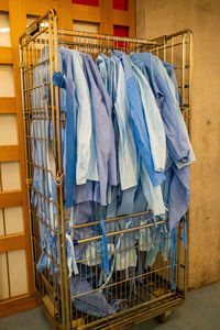 Clothes drying against blue wall