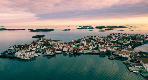 High angle view of boats in sea against sky