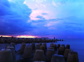 Scenic view of sea against cloudy sky