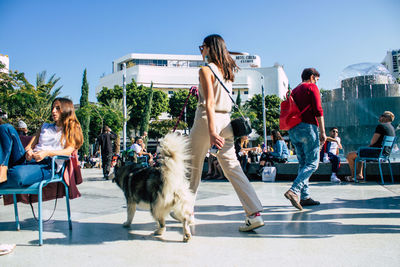 People on zebra crossing in city