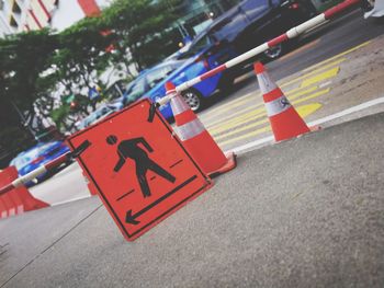 High angle view of traffic sign on road in city