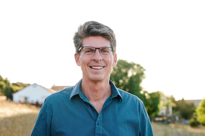 Portrait of a handsome man smiling while outdoors