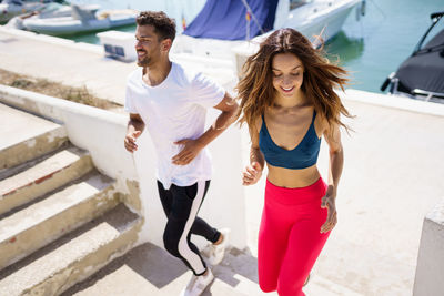 Young couple exercising outdoors