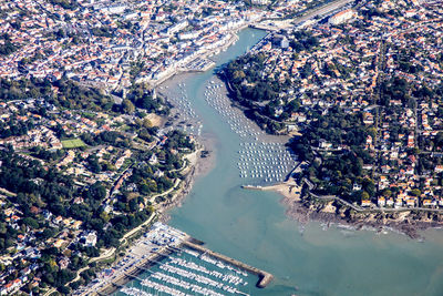 High angle view of river amidst cityscape