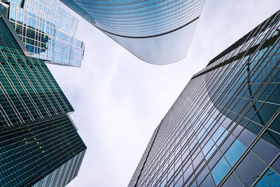 Low angle view of modern buildings against sky