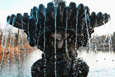 Panoramic view of fountain in sea